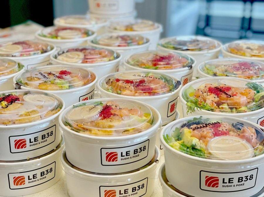 Fresh salmon poke bowl with avocado and crispy vegetables in Montreal restaurant